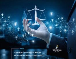 imagem do símbolo balança da justiça sobre a mão de direita de uma pessoa, capa da Cartilha de Precedentes: Movimento de Suspensão do TRT-2